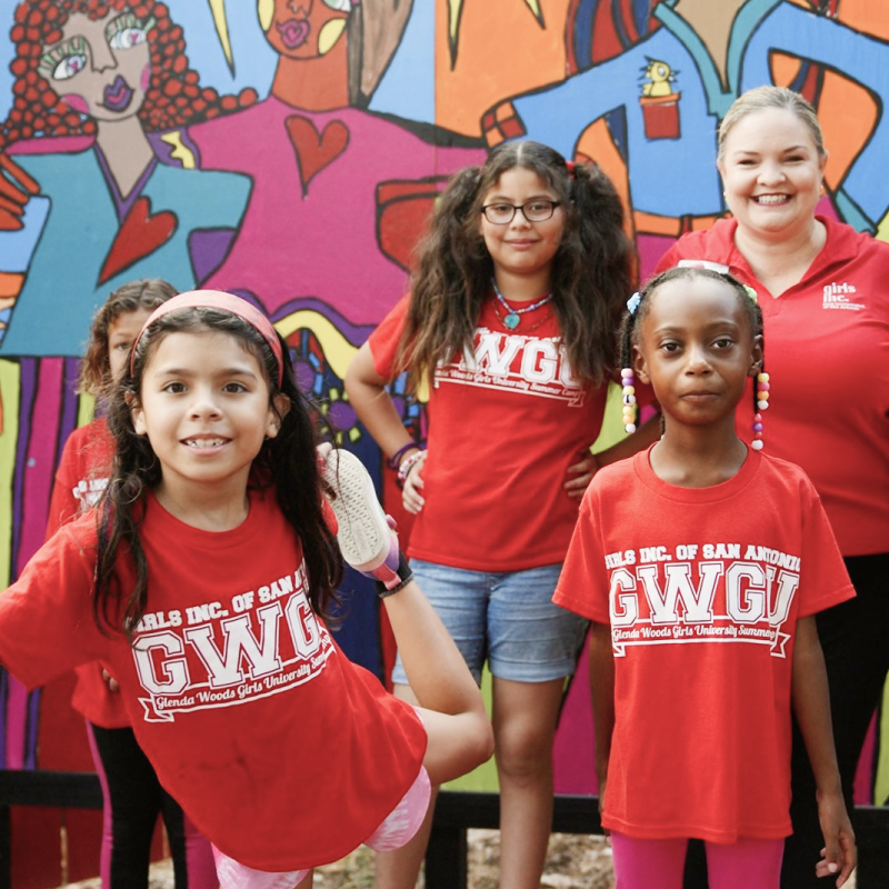 Kids in front of mural
