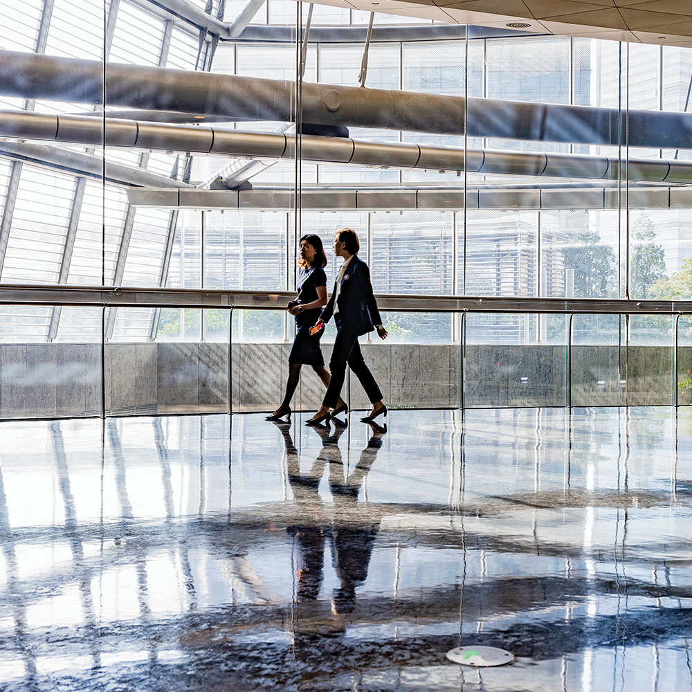 Two individuals walking 