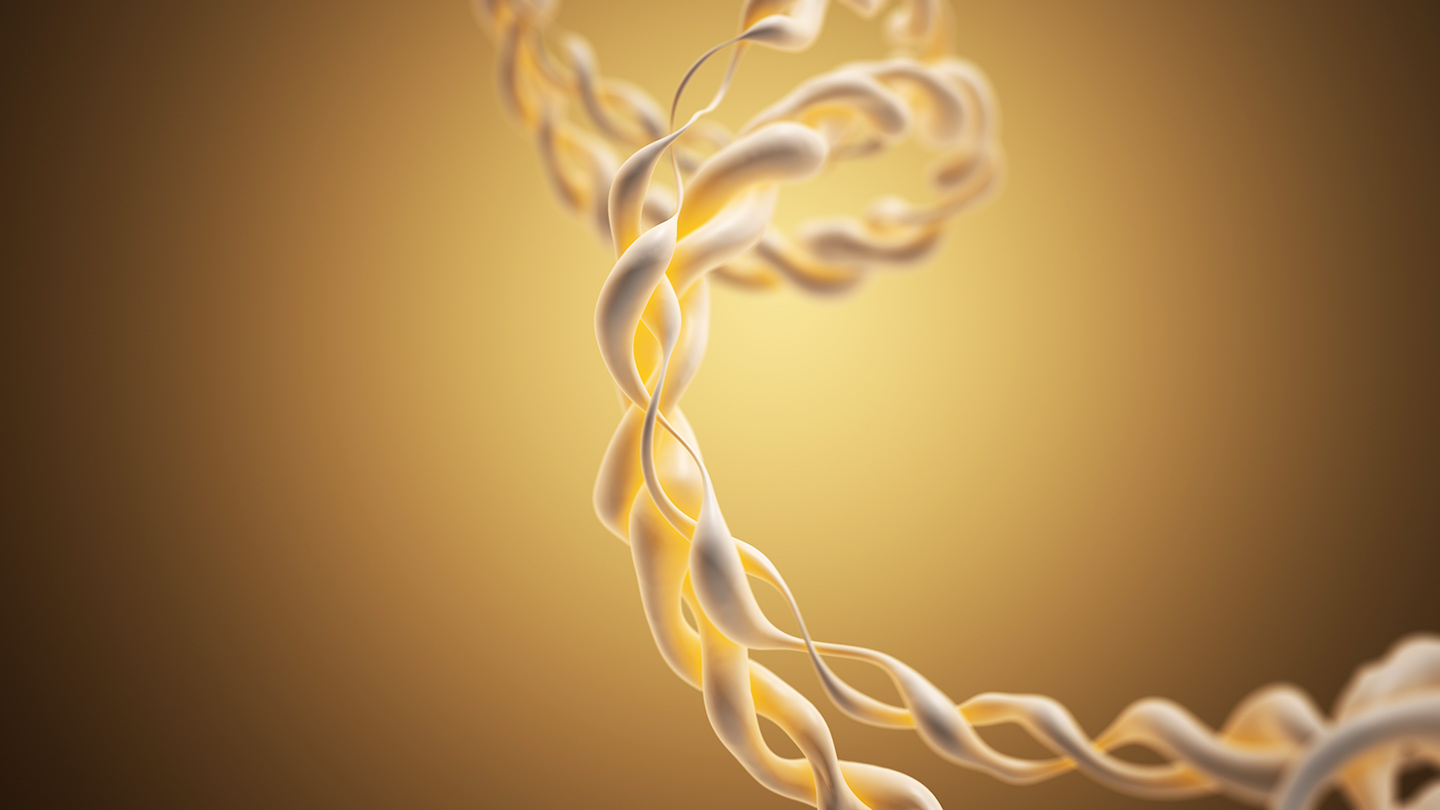 Abstract close-up of intertwined, ribbon-like strands forming a loose circular loop against a warm gold background, with the foreground strands in sharp focus and the rest softly blurred.