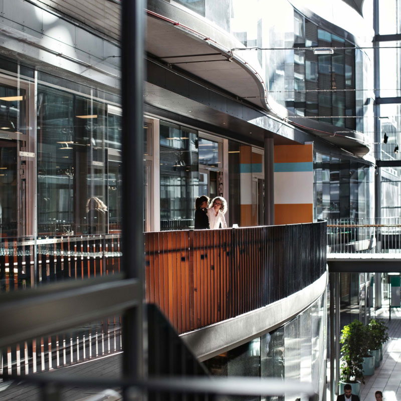 2 people on a balcony