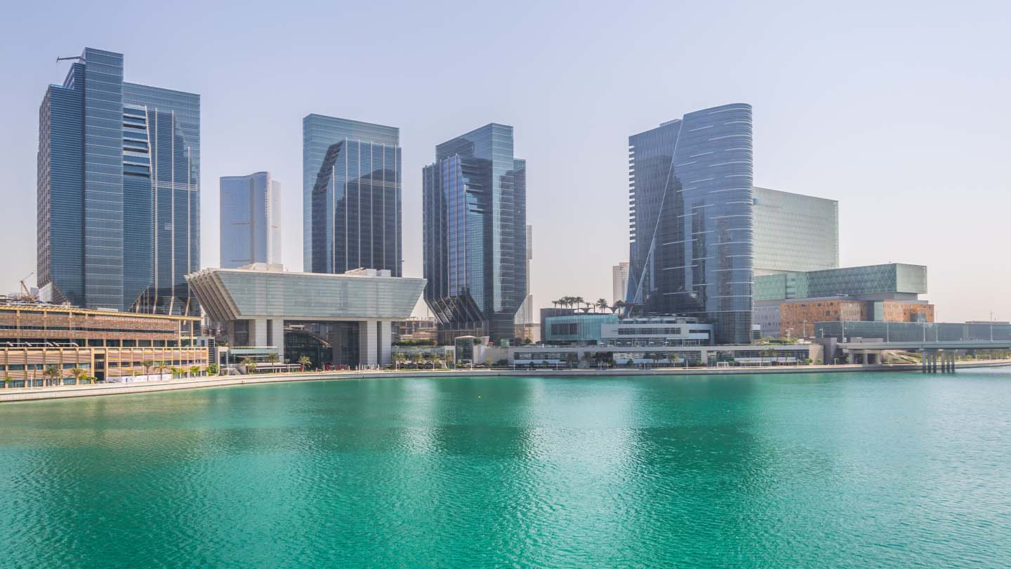 city skyline with a lake