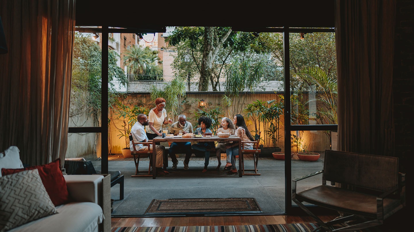 Family gathered at the table at home
