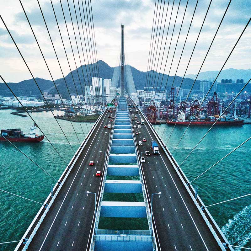 cars driving through bridges
