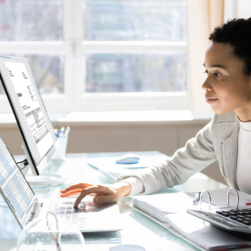woman using computer in office