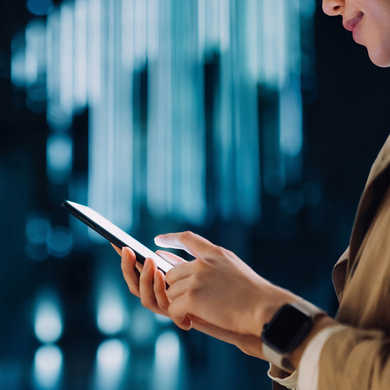 man using phone in hand